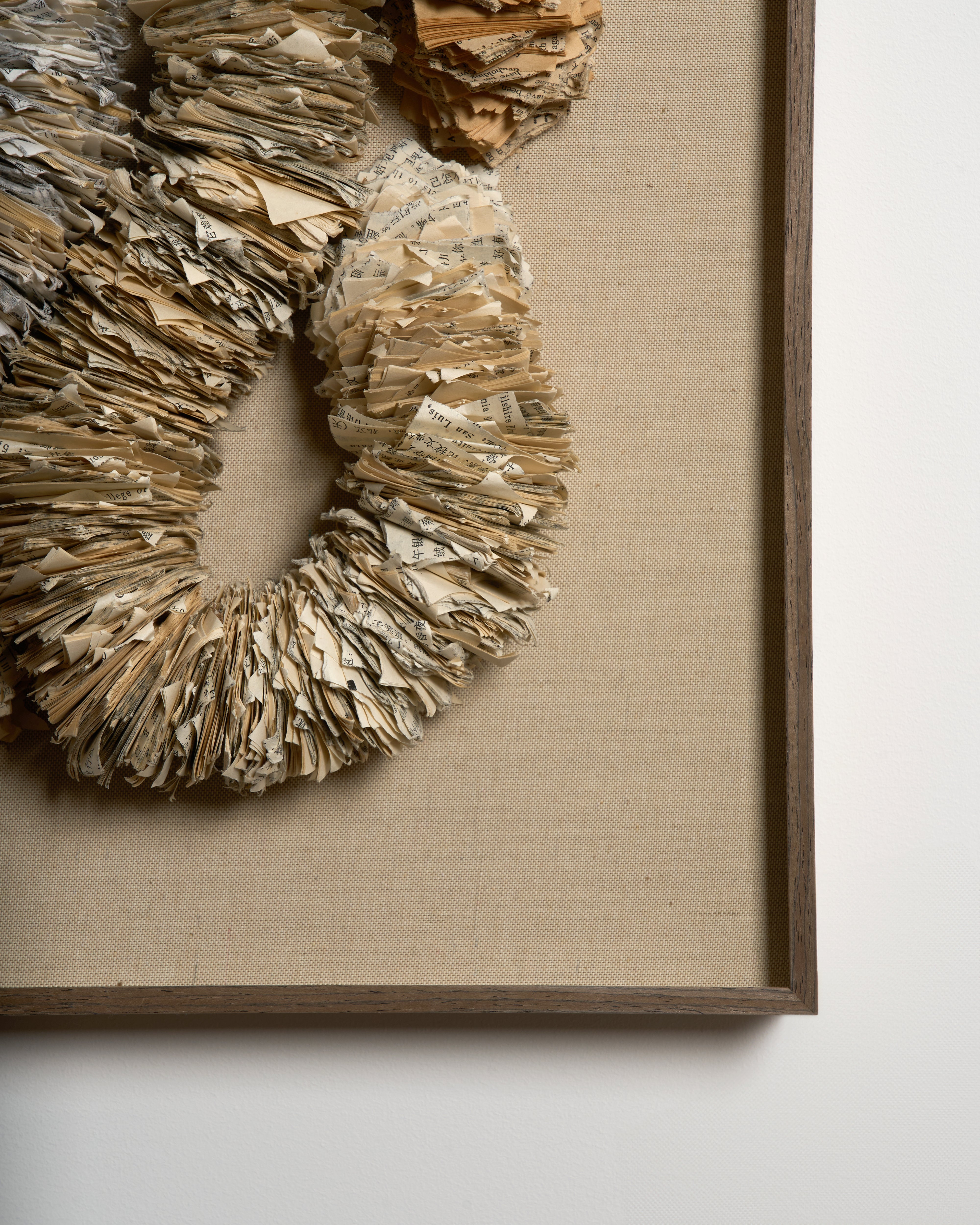 Close-up of Eternity hand formed paper wall art revealing handcrafted textures and refined artistic detailing
