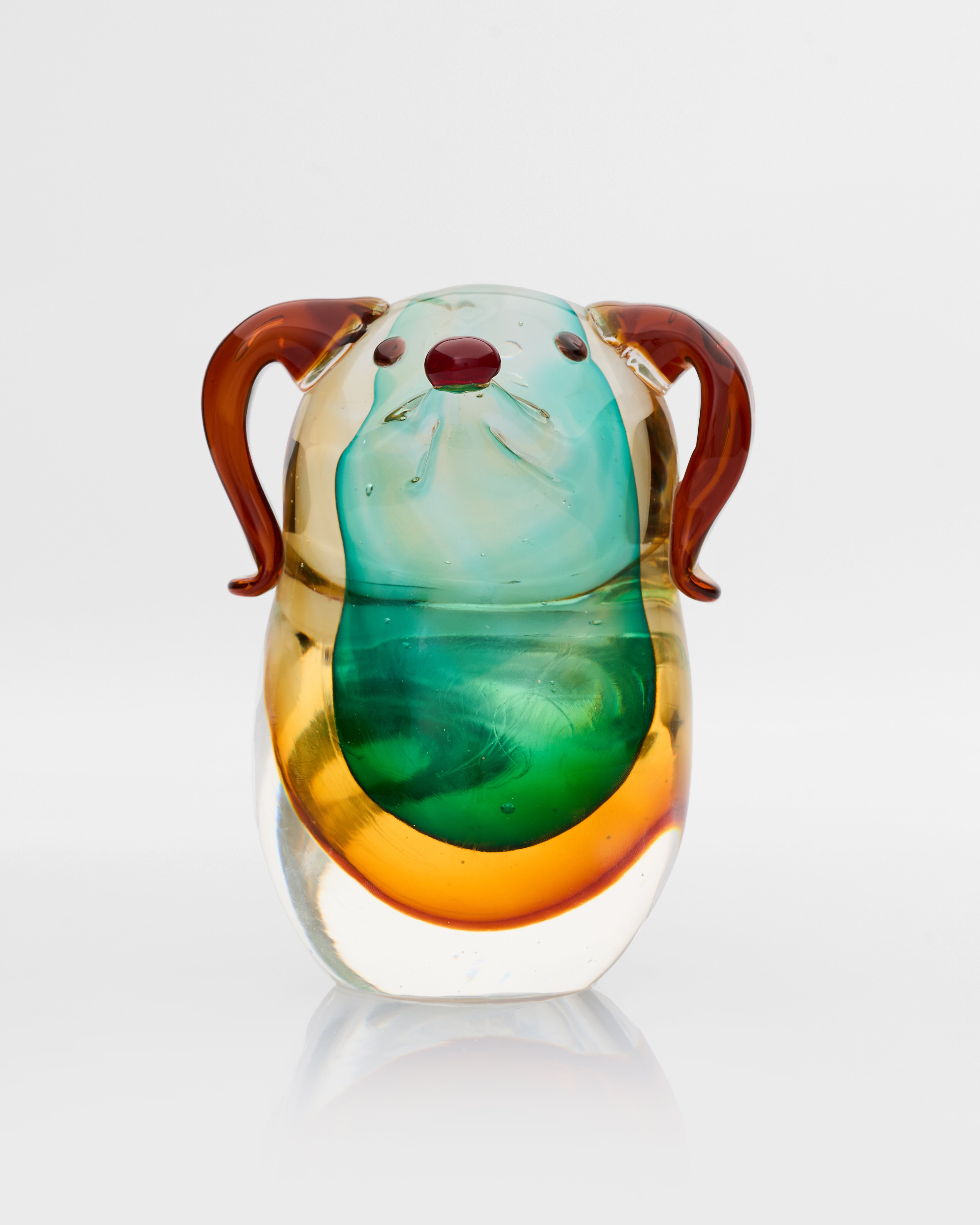 Front view of glossy puppy glass decor showcasing smooth polished finish and detailed sculptural form
