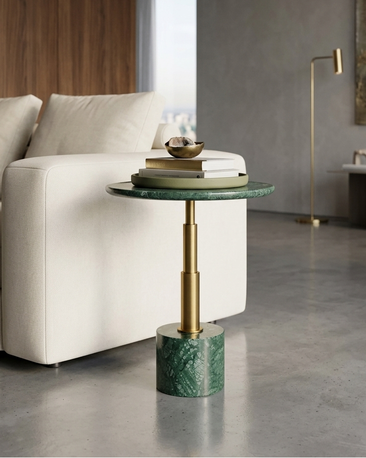 Modern living room with a green marble side table and white sofa.