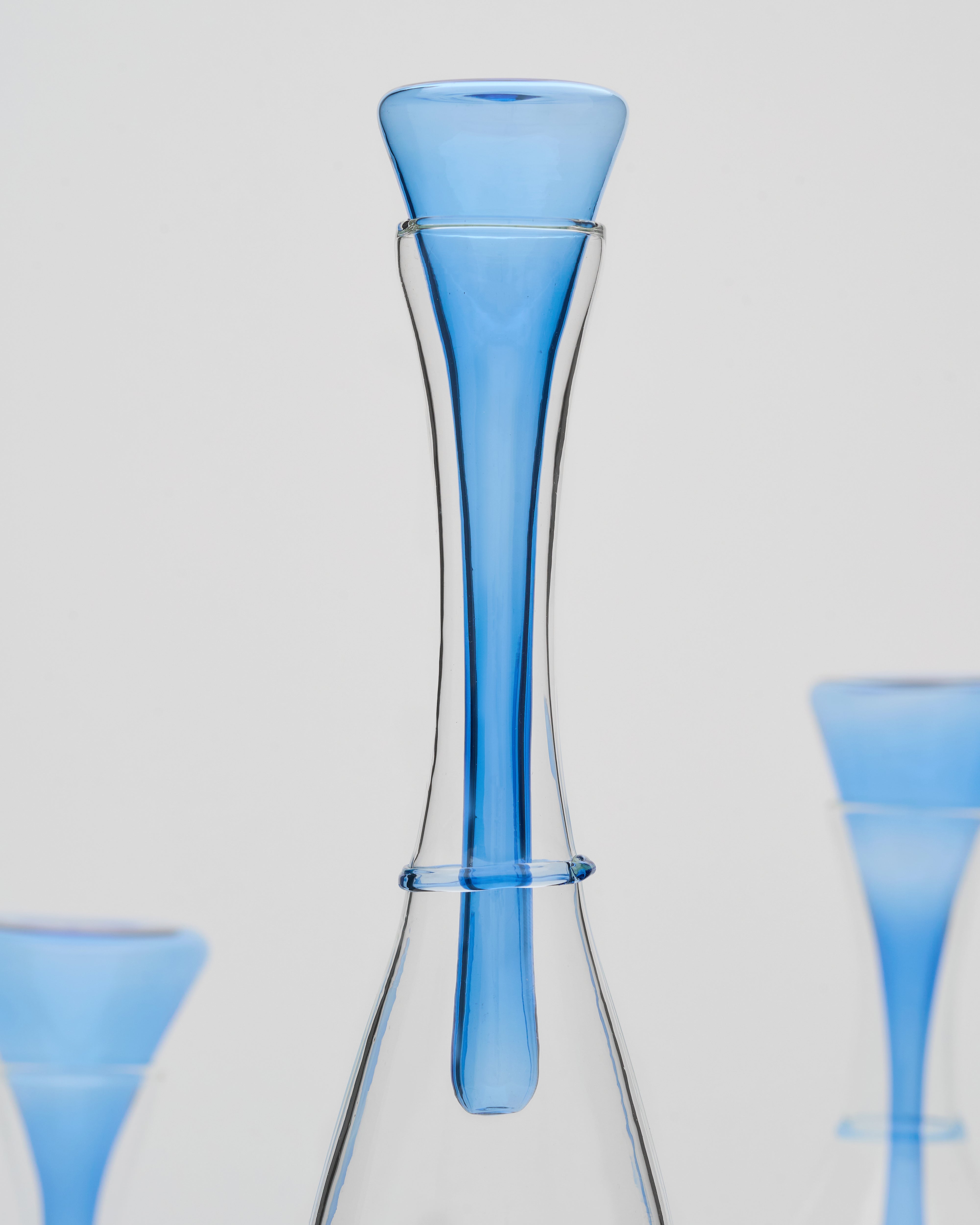 Close-up of hour glass inspired ornament set detailing smooth surface texture and refined craftsmanship
