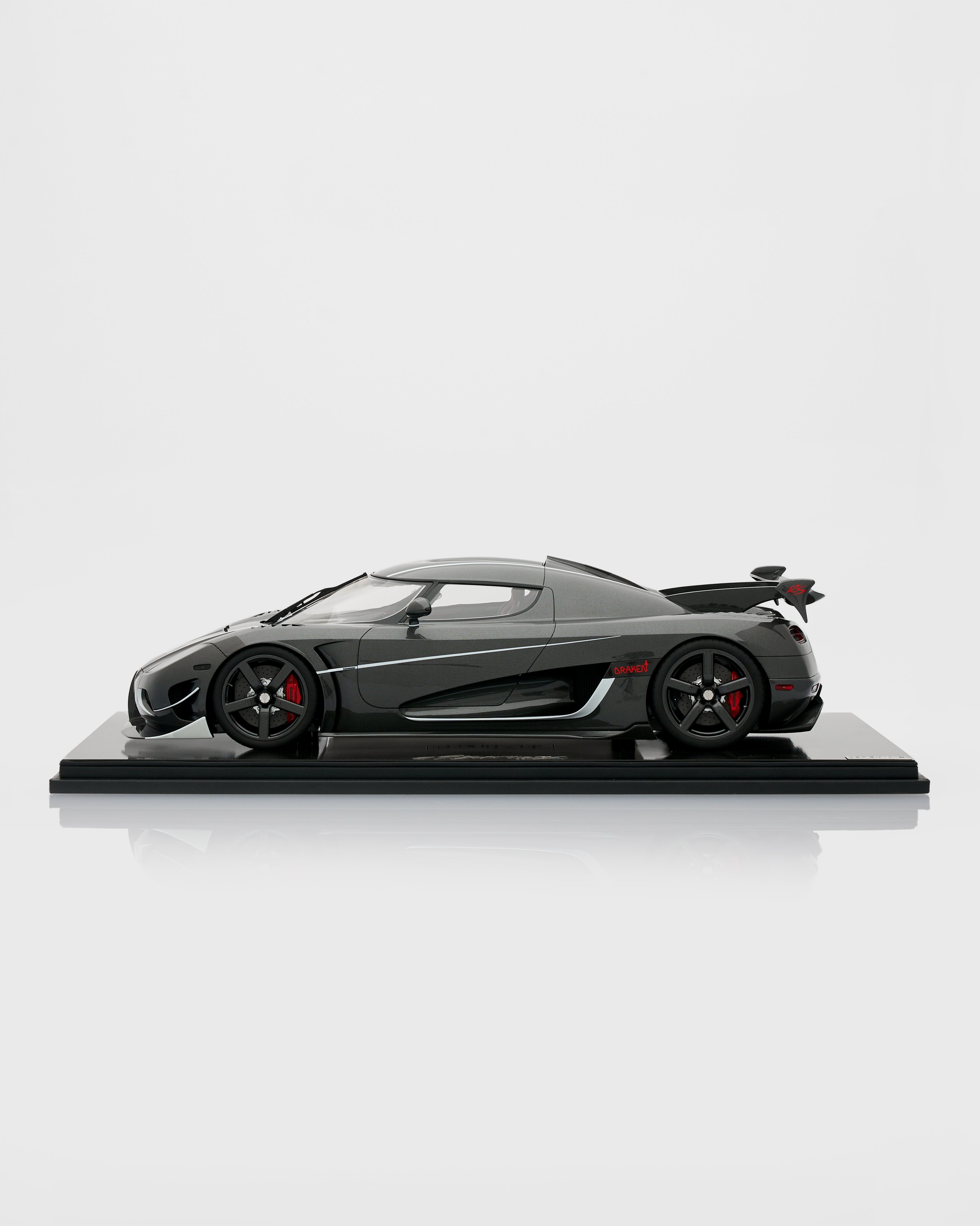 Koenigsegg Agera RS Draken 7137 scale model styled as a high-end automotive collectible for refined interiors
