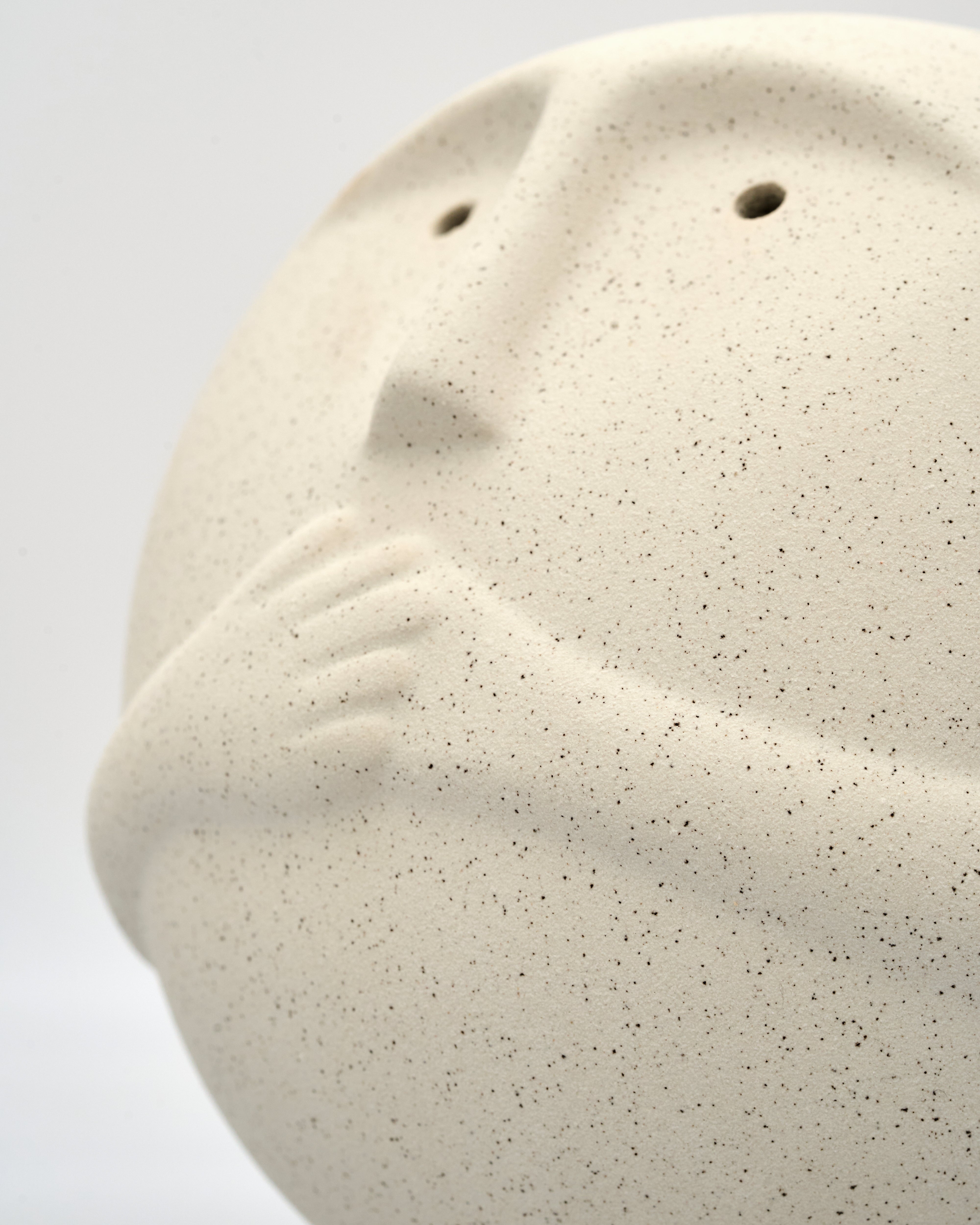 Close-up of Minimalist Three Virtues sculpture revealing smooth texture and premium material craftsmanship

