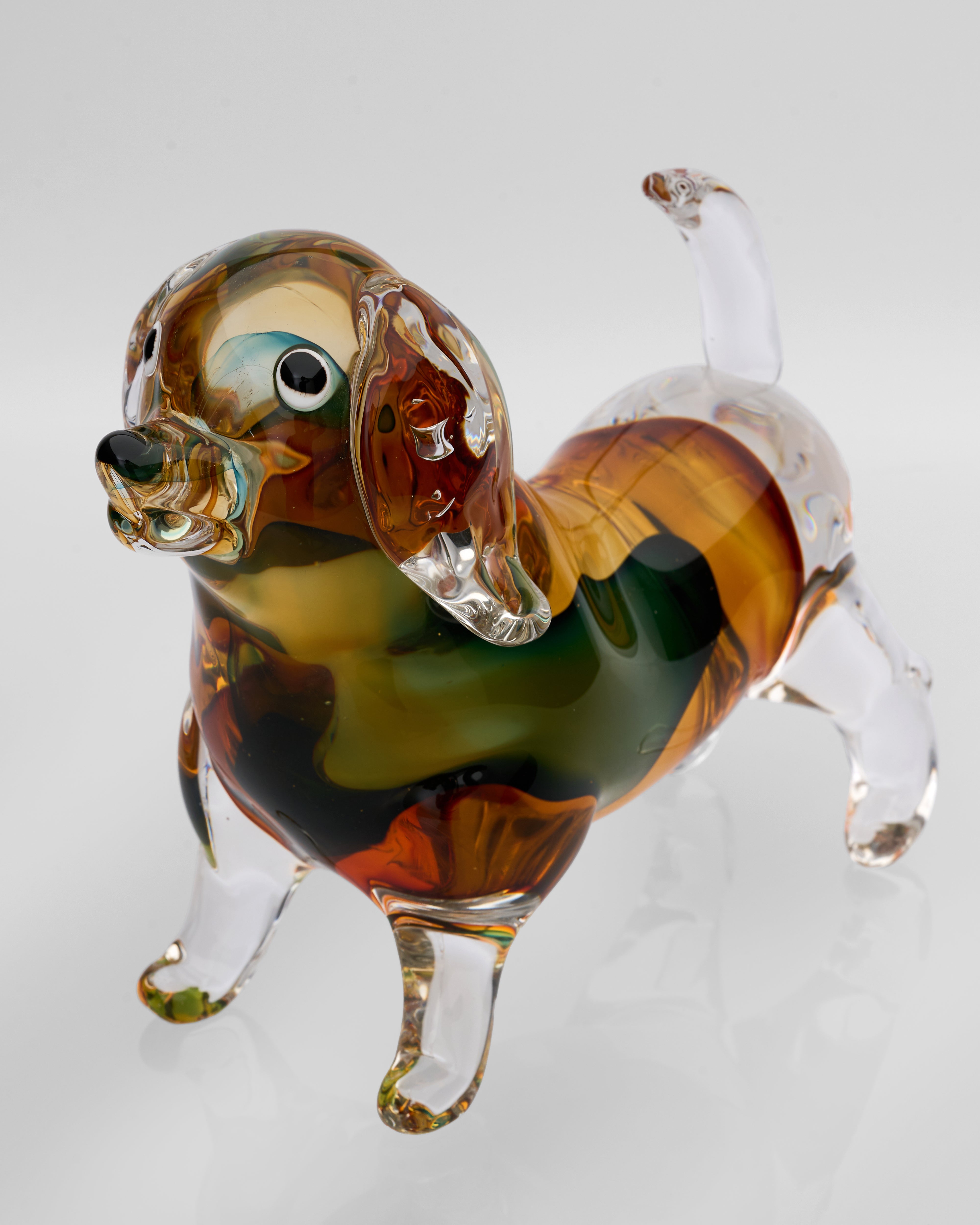 Angled view of Noctyra short puppy glass decor emphasizing luminous shine and artistic craftsmanship
