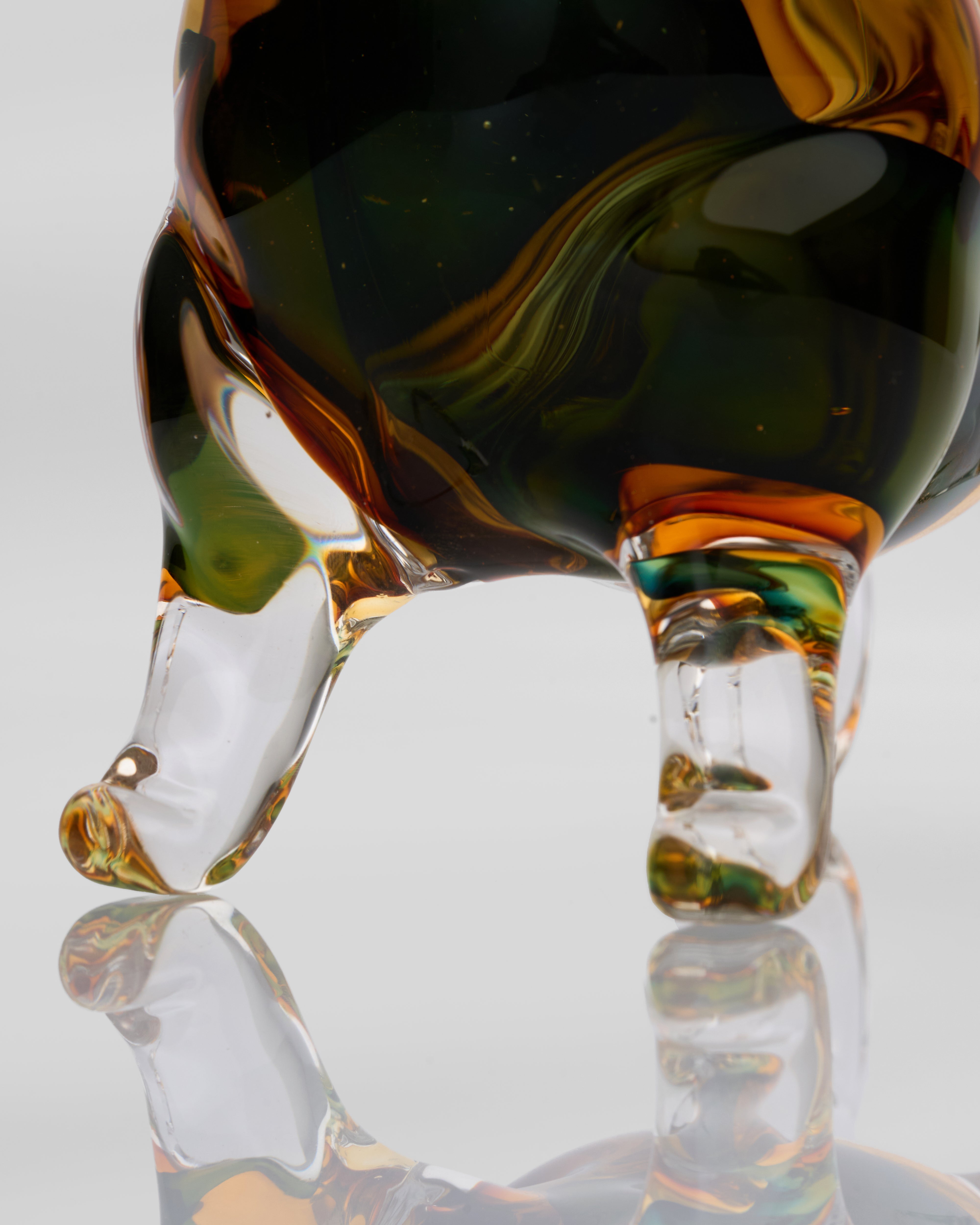 Detailed view of Noctyra short puppy glass decor highlighting sculptural features and refined craftsmanship
