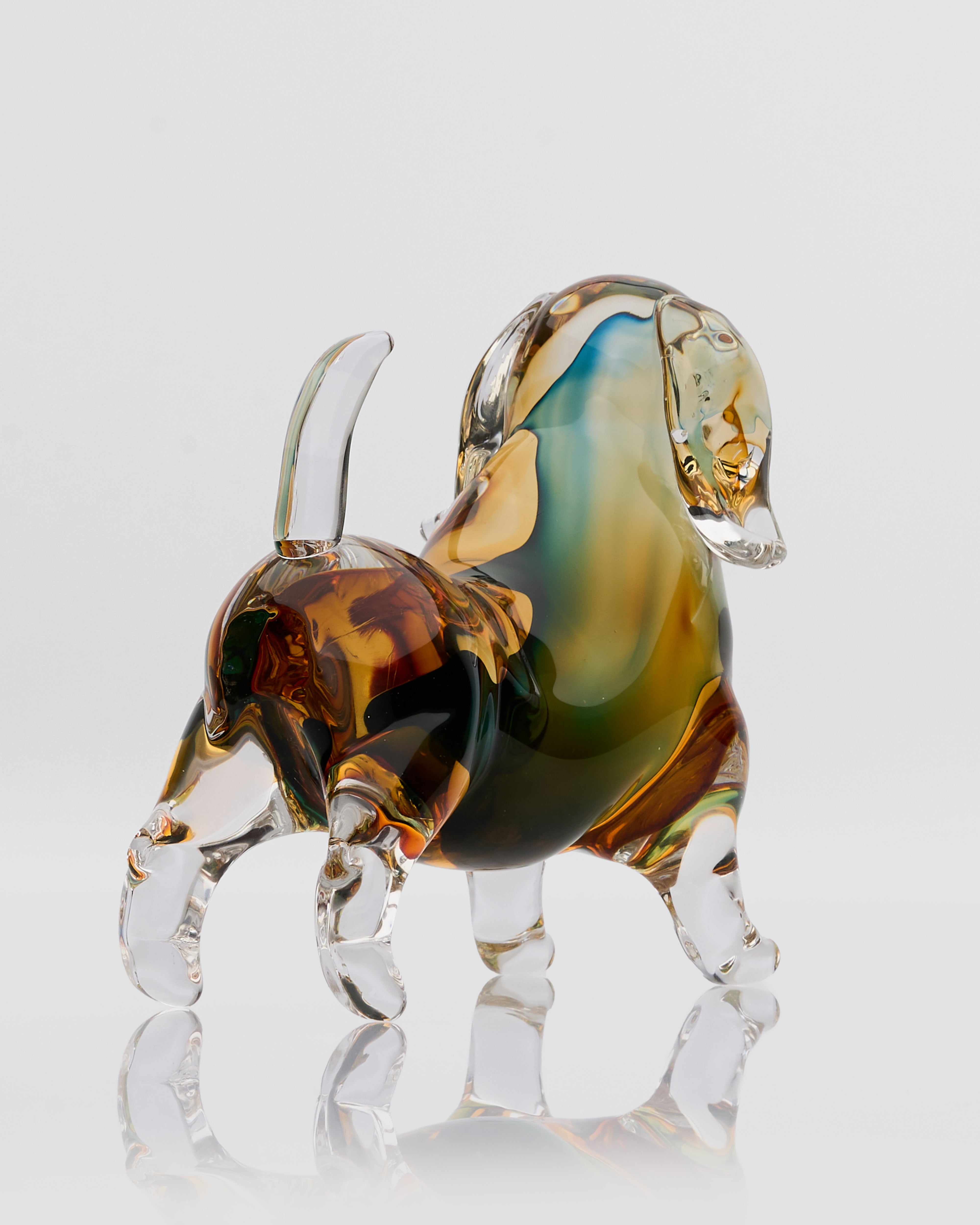 Side view of Noctyra short puppy glass decor highlighting compact proportions and elegant contours
