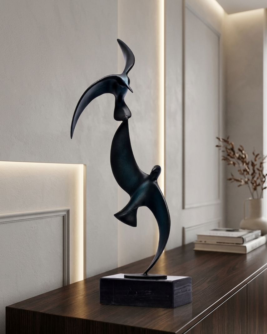 Abstract sculpture on a wooden surface in a modern interior setting