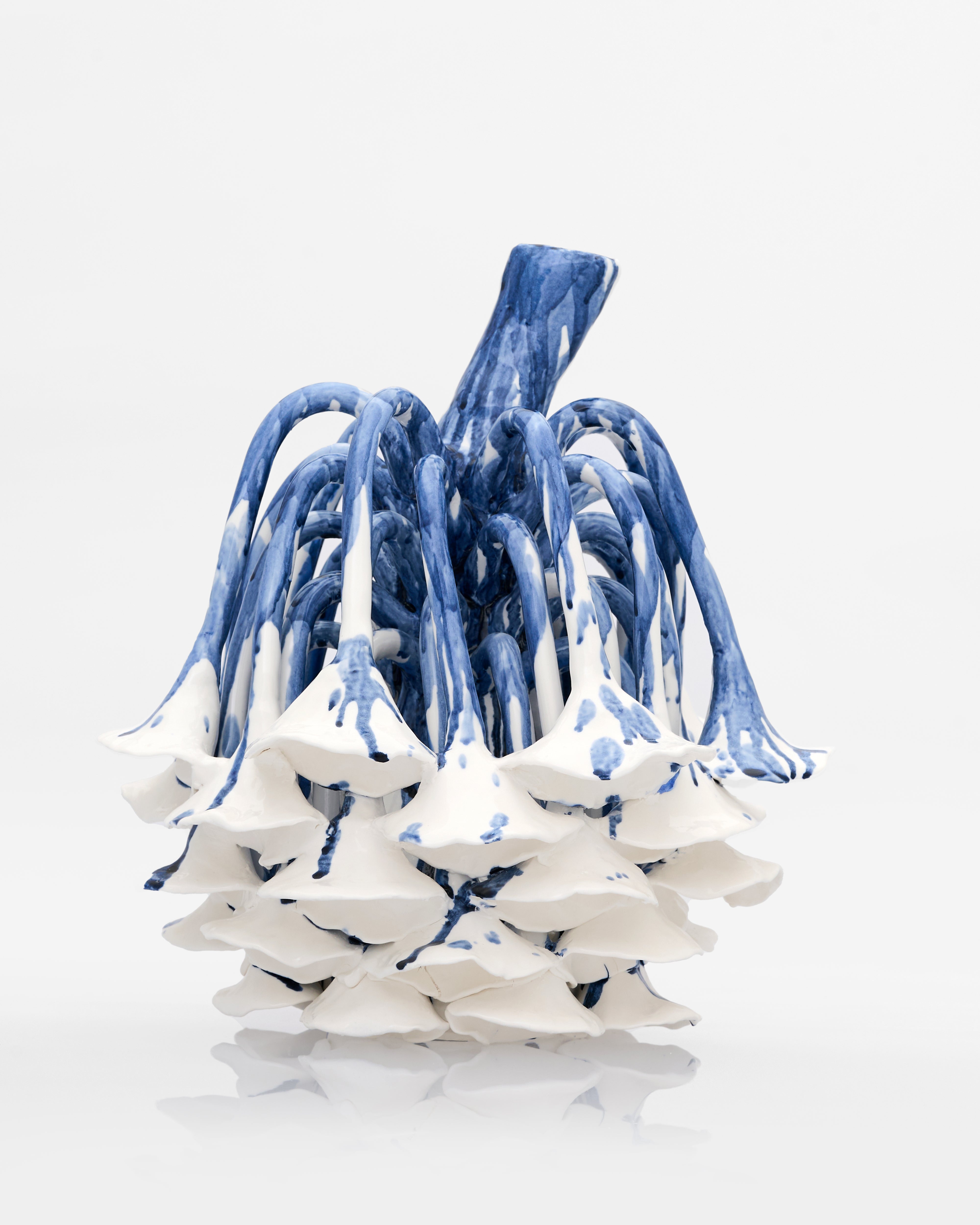 Radicle Decor with porcelain-like metal finish styled in a luxury interior as a contemporary decorative accent
