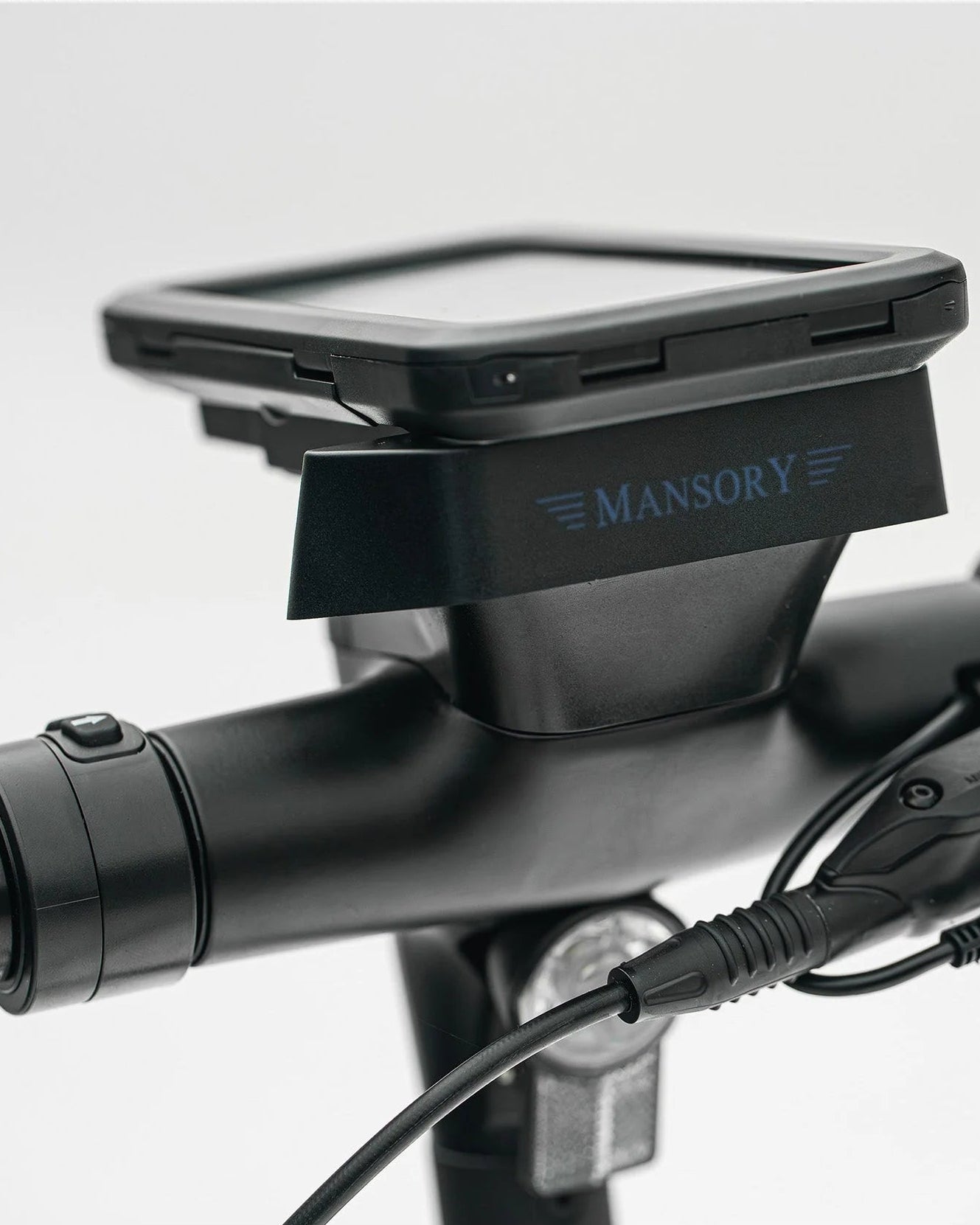 Mansory motorcycle handlebar mount with screen on a white background