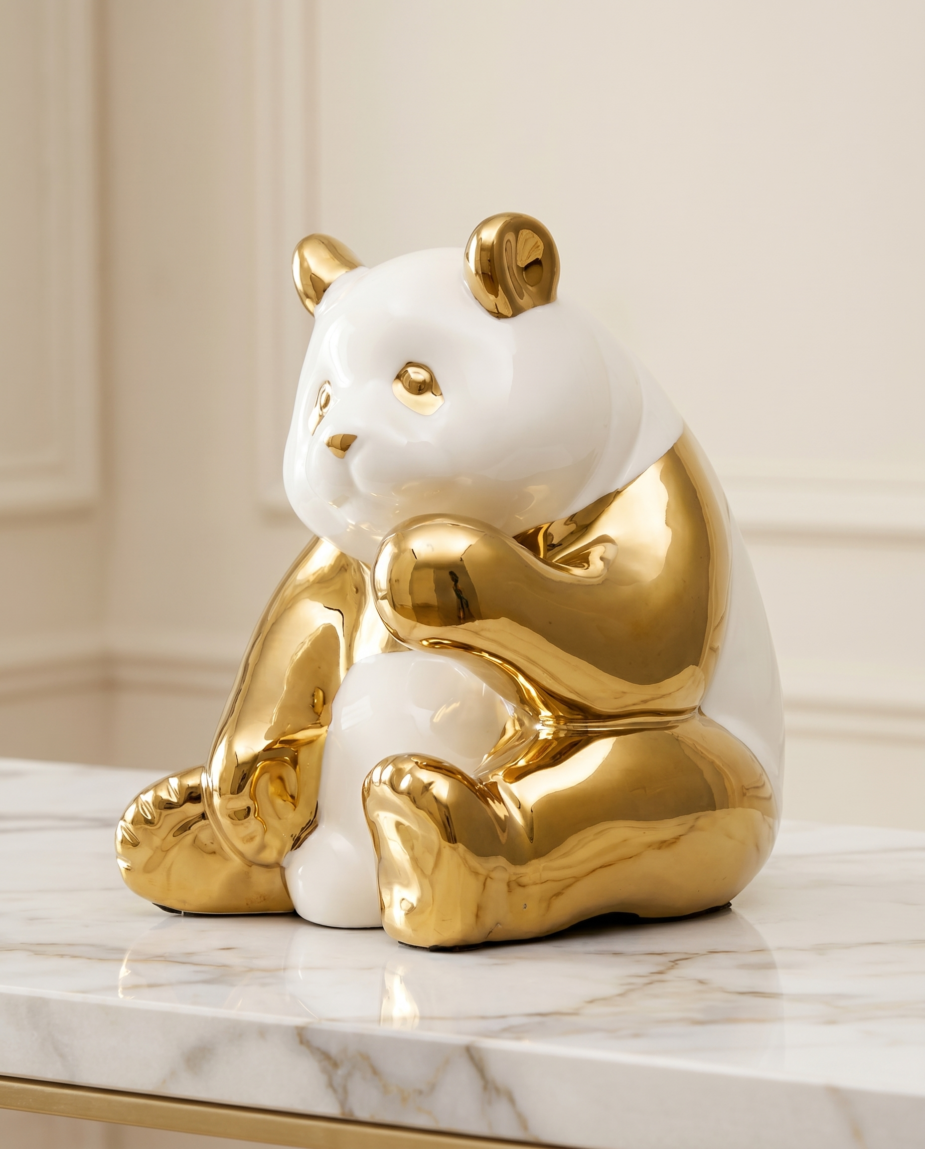 Zenora Ceramic Sitting Golden Panda Figurine