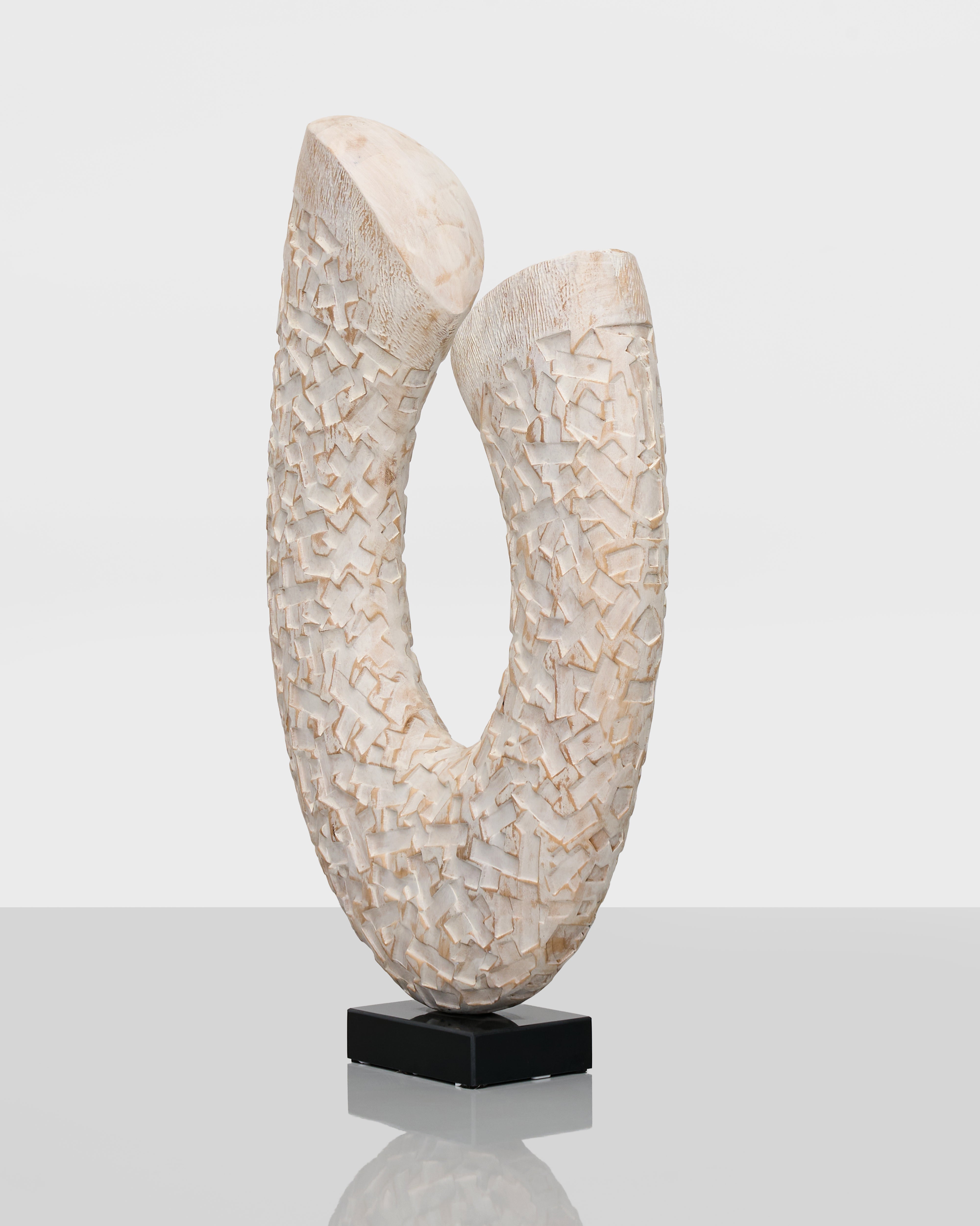 Textured U-Form Decorative Sculpture styled in modern interiors adding artistic sophistication and elegance
