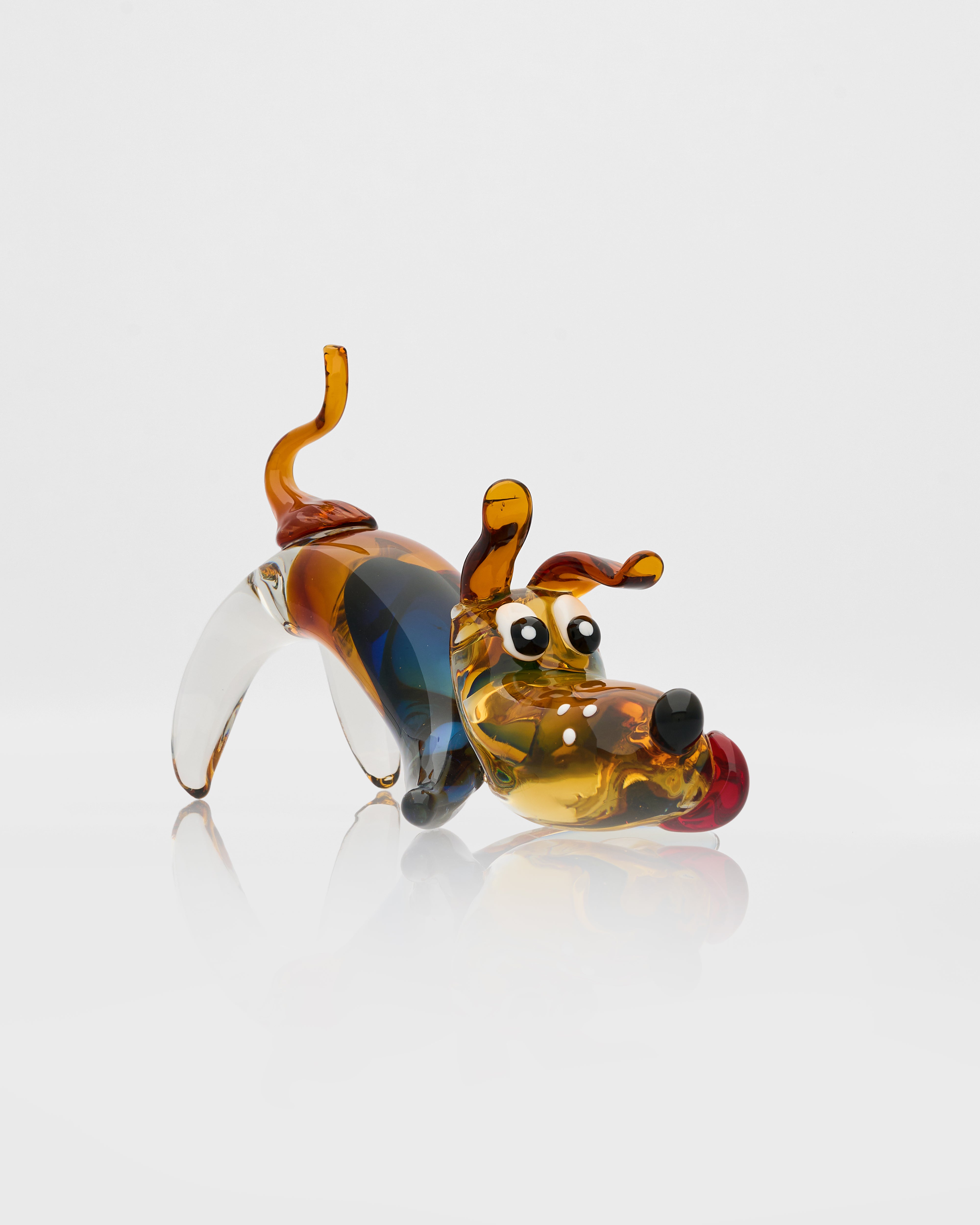 Glass figure of a dog on a white background