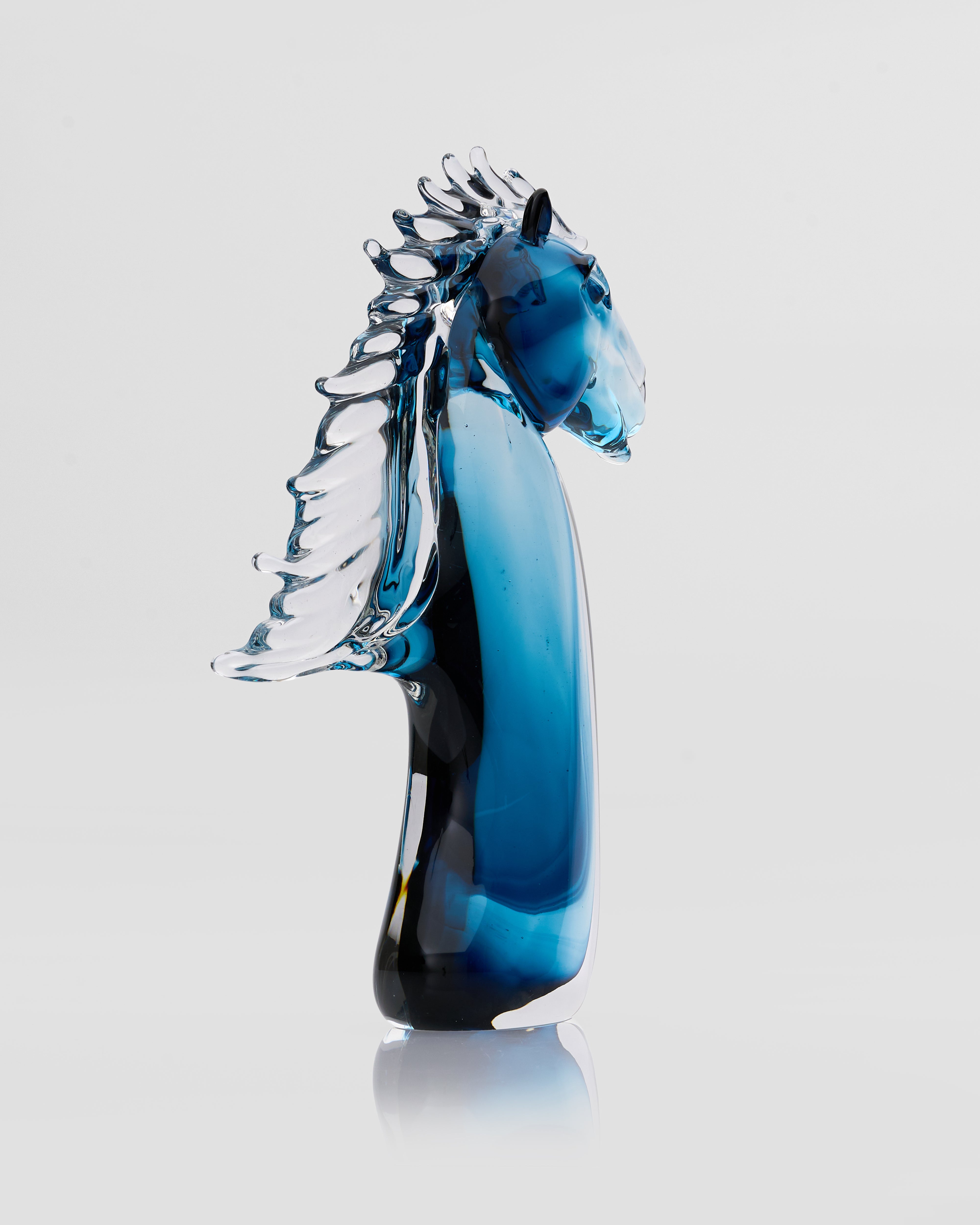 Side view of Zaphire blue clear horse decor highlighting sculptural contours and luminous crystal finish
